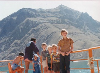 Inset: Peter Mayhew-Smith (right), aged 12, in Iran with younger brothers Alex (blue flowery t-shirt), Nick (grey striped t-shirt) and family friends 