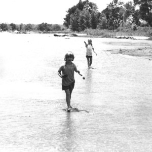 Layzelle and sister Sibell playing in the Athi River, Kenya