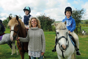 Haze with twins Alex and Kat at a Pony Club Show