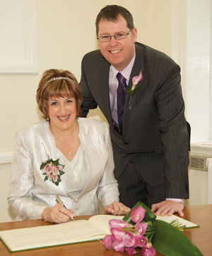 Fovargue and husband Paul on their wedding day in 2009