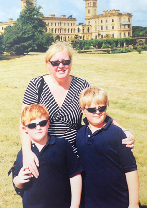 Parrett with sons, from left, Greg and Ollie at Osborne House on the Isle of Wight in 2014