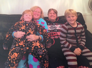 From left: Parrett’s son Greg, Parrett, husband David and son Ollie at Christmas