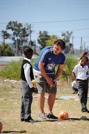 Greg gives expert advice to a South African pupil.