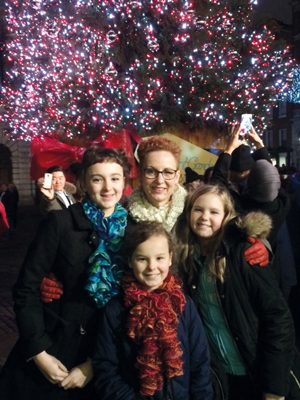 Cole’s daughters Madeleine and Elspeth (middle left and right), wife Justine and daughter Isabelle on New Year’s Eve 2014