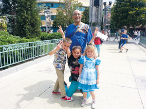 Forbes at Disneyland Paris in 2013 with from left, son Zinedine, aged eight, and daughters Aisha 11 and Miriam six 