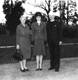 Legrave with her parents Edna (left), and Dermot (right) when she served in the army