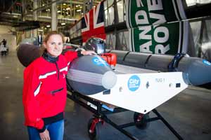 Apprentice Danielle Thomas, aged 18, with the finished boats at Land Rover BAR HQ