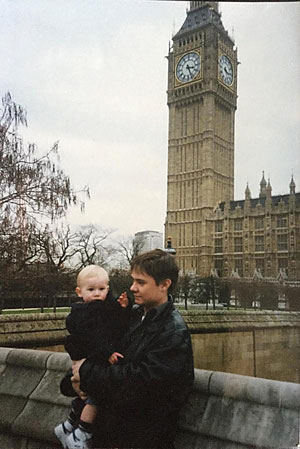 Wright holding his year old son Ben in 1995 outside the Houses of Parliament 