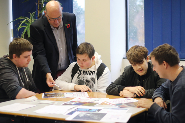 Mr Gulliver with, from left: Lewis Wright, aged 17, Nikita Kuznecov, Olly Clarke, and Liam Foster, all aged 16