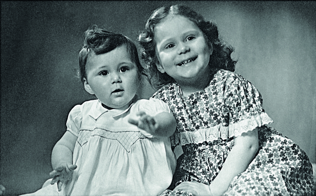 Morpeth (right) and younger sister Caroline in 1950