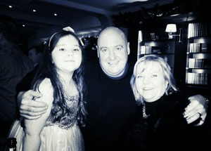Lappin with husband Peter and grand-daughter Grace, eight