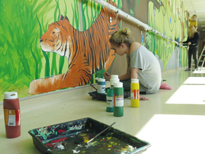 Samantha Clark working on the tiger painting