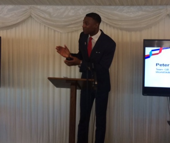 Peter Bakare on stage at the Team UK send off event in parliament