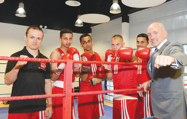 Boxing champ steps into the ring Boxing champ steps into the ring