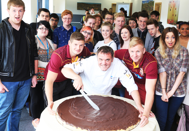 Rugby stars tackle giant jaffa cake Rugby stars tackle giant jaffa cake