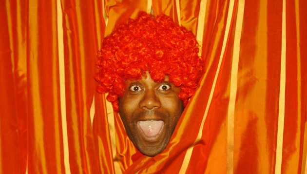 Lenny Henry poses at a press conference ahead of red nose day. | FE Week
