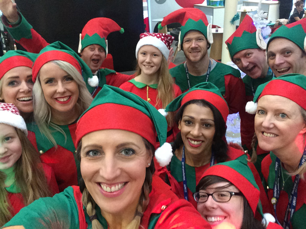 Elves running festive college fair Elves running festive college fair