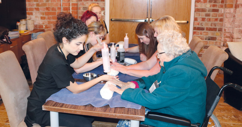 Dementia sufferers and their carers get pampered Dementia sufferers and their carers get pampered