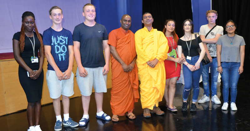 Pair of Buddhist monks teach staff and students the history of Buddhism Pair of Buddhist monks teach staff and students the history of Buddhism
