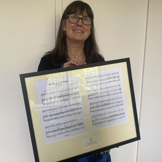 feature Karen with the notes of a song she has performed with the Royal Choral Society inset | FE Week