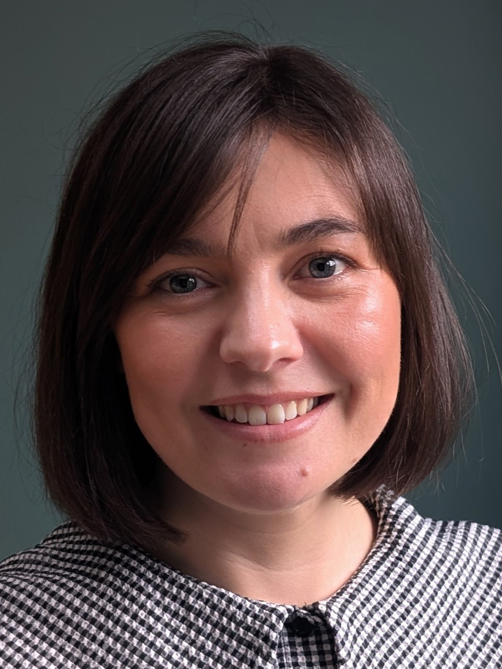 Headshot of Carly Lambton-Howard